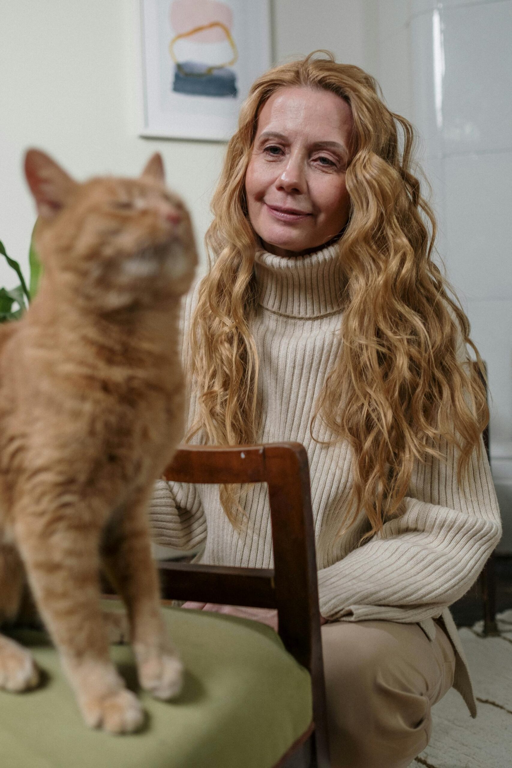 Woman with orange cat